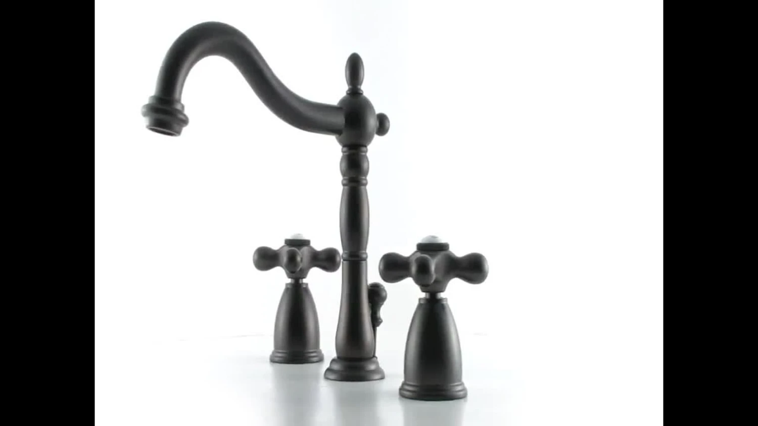 Kingston Brass Widespread Bathroom Faucet With Plastic Pop-Up, Oil Rubbed Bronze 2 Kingston Brass Widespread Bathroom Faucet With Plastic Pop-Up, Oil Rubbed Bronze - Image 2