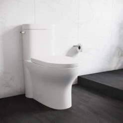 Monaco One Piece Elongated Left Side Flush Handle Toilet 1.28 Gpf