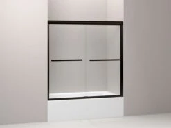 Kohler Gradient Sliding Bath Door, Crystal Clear Glass, Anodized Dark Bronze